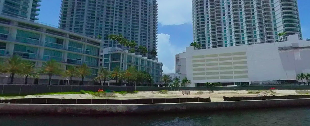 The two towers will overlook the Miami River